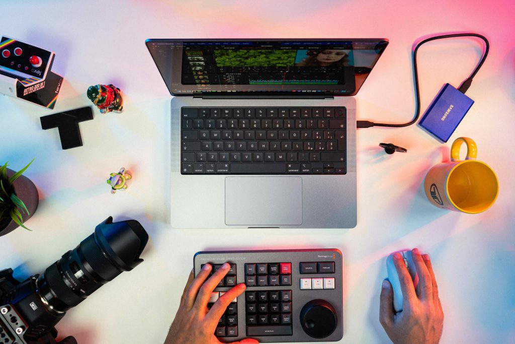 Laptop with other content creation tools at a desk.